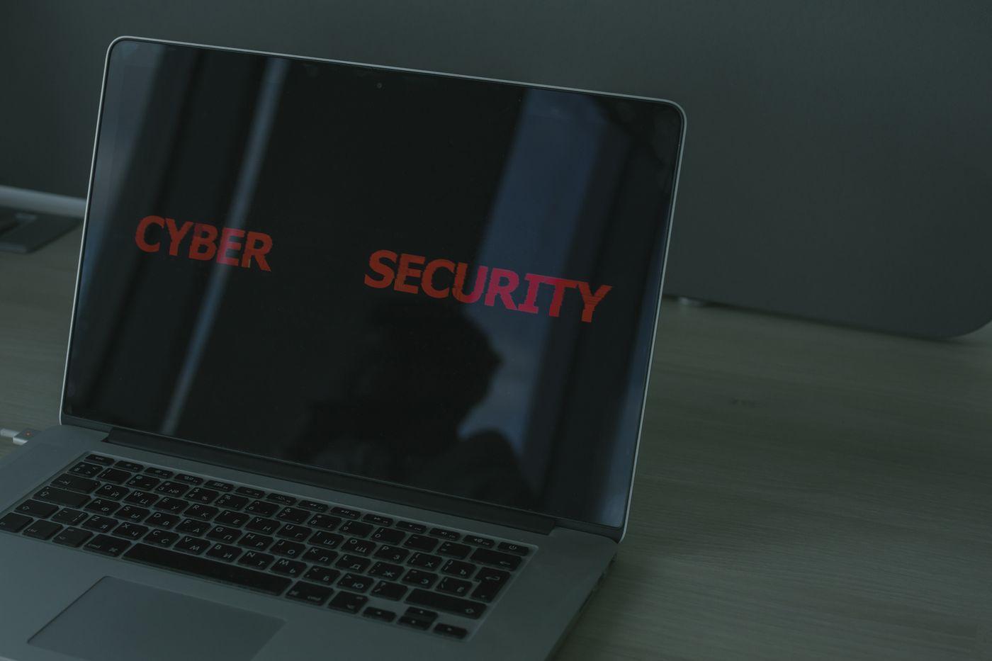 Laptop displaying the words Cyber Security
